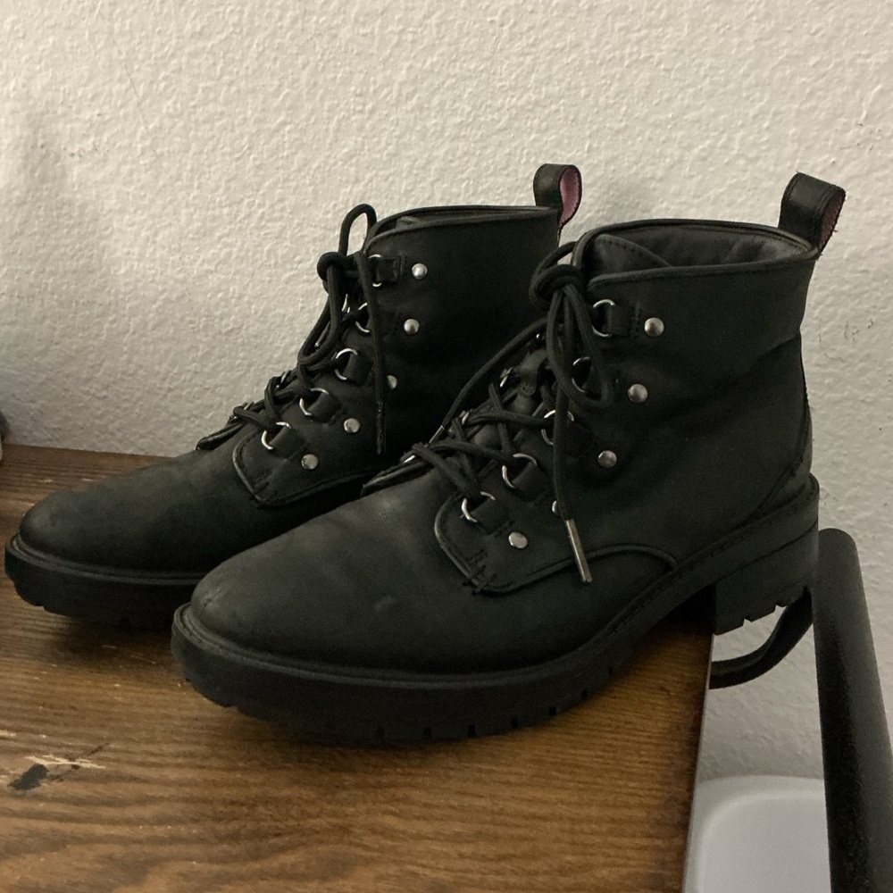 Cole Haan black leather lace up boots with pink accents